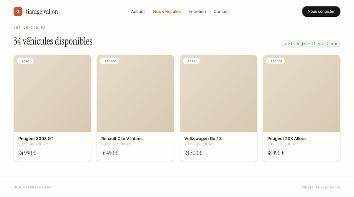 Le site du garage avec 34 véhicules en ligne, à jour, présentés en grille.